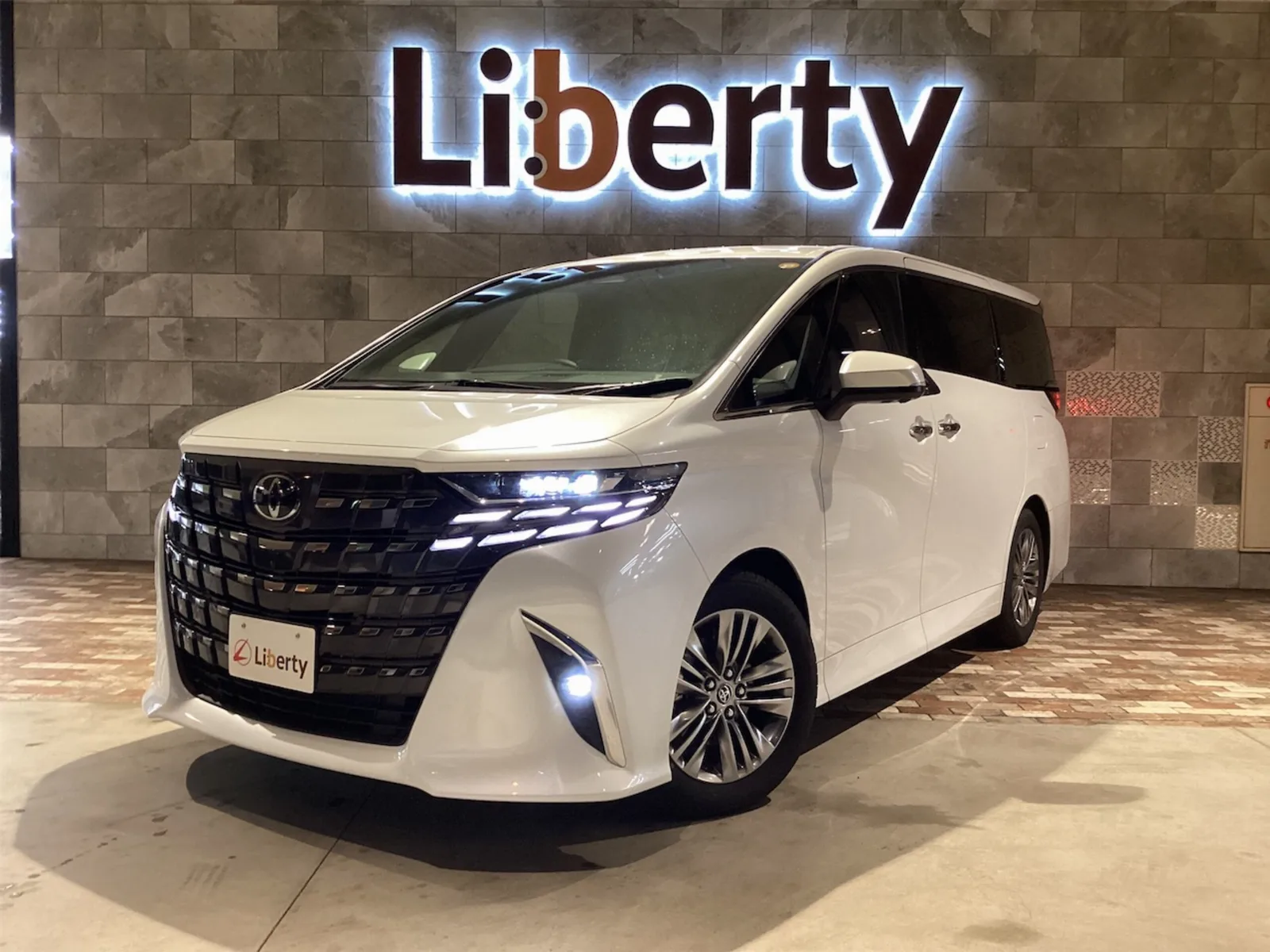 Toyota Alphard Hybrid 2.5 Z - Genuine 14-inch Navigation, Digital Inner Mirror, Blind Spot Monitor, Power Back Door, Panoramic View Monitor, Electronic Parking Brake, Collision Mitigation Braking, Dual Power Sliding Doors, Genuine 18-inch Aluminum Wheels, LED Headlights